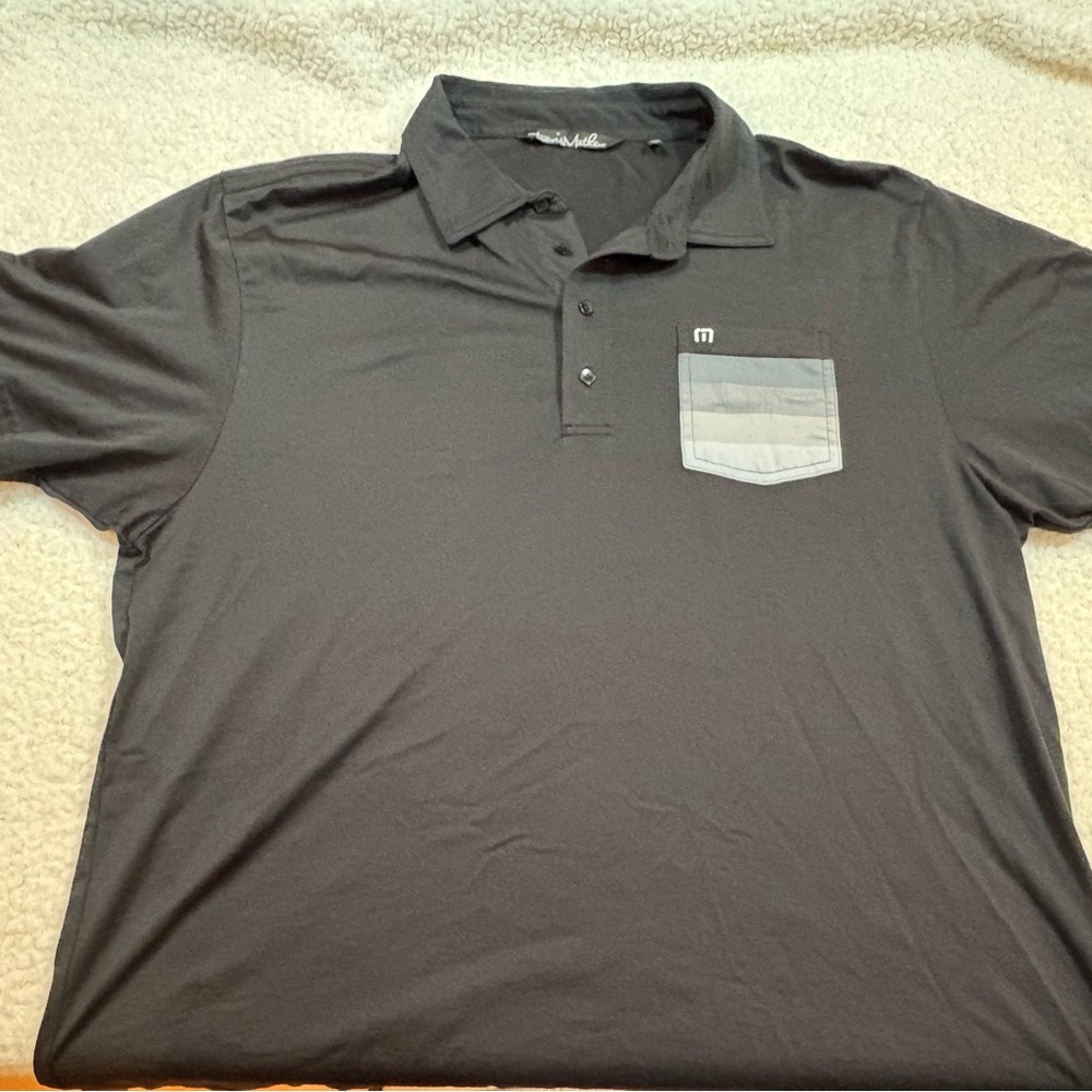 Travis Mathew Black Polo with 4 Shades of Gray Pocket